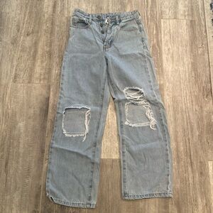 Princess Polly size US 0 ripped denim jeans a with buttons.  Gently worn